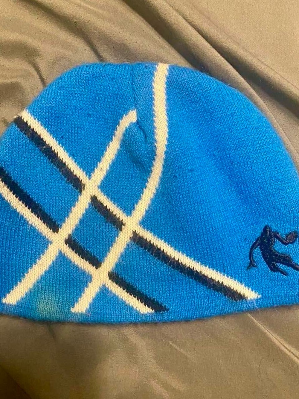 And1 Kids Bright Blue Knit Beanie with White and Navy Stripes (has stain visible